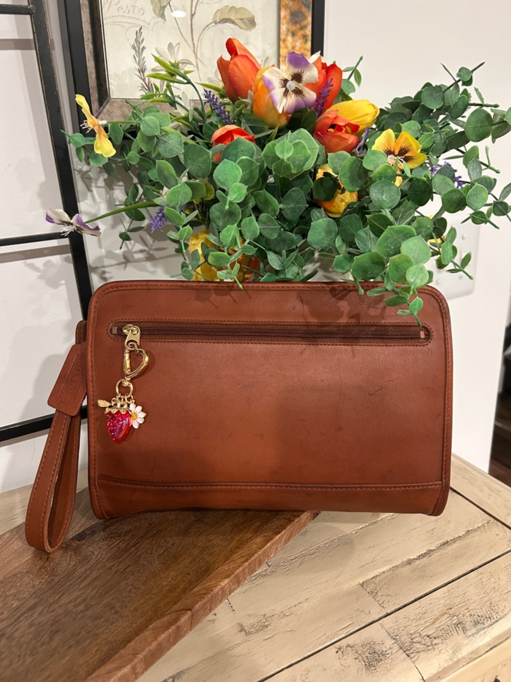 Coach Brown Leather Wristlet with Gold Hardware and Red Strawberry Charm